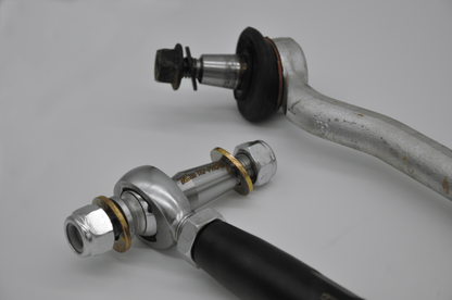 Heavy Duty TCP Tie Rod Compared to OEM Tie Rod for Polaris RZR Pro R, Close-up angle of rod ends and steering bolts
